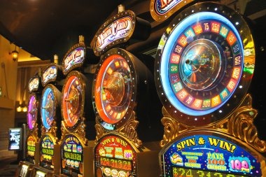 kel macau Mega Wheel interface showing spinning wheel with segment odds and stake placement buttons